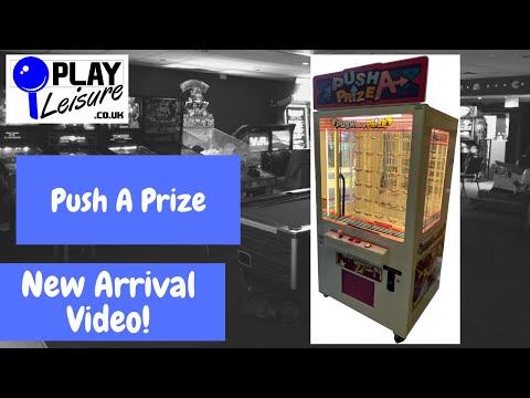 Through the keyhole?! It's the Push A Prize Arcade Machine...