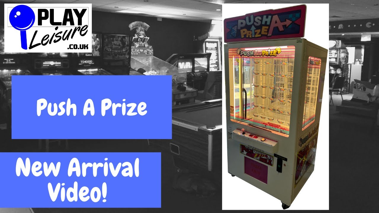 Through the keyhole?! It's the Push A Prize Arcade Machine...